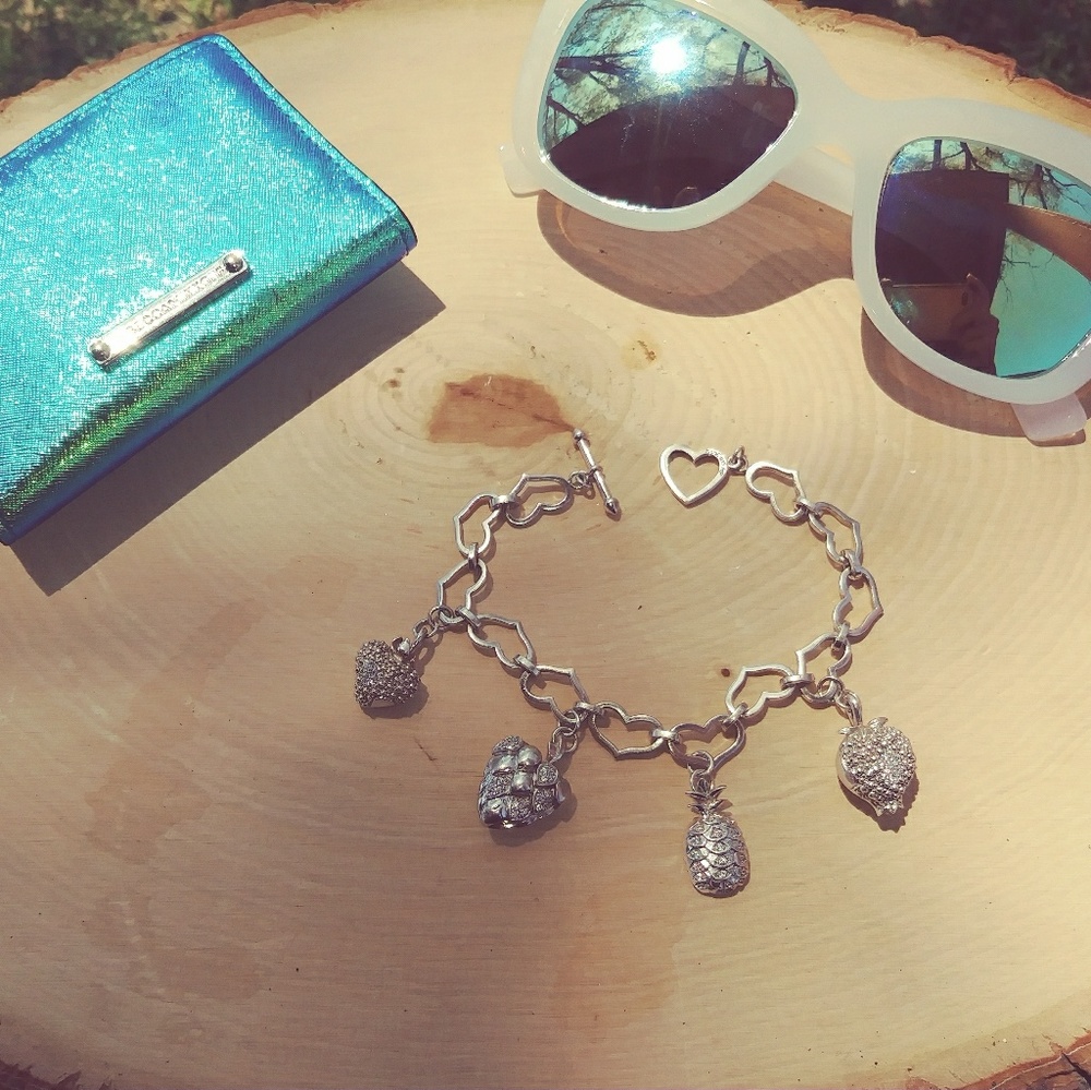 Sterling silver charm bracelet.